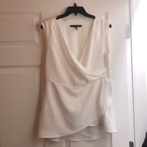 White sleeveless blouse